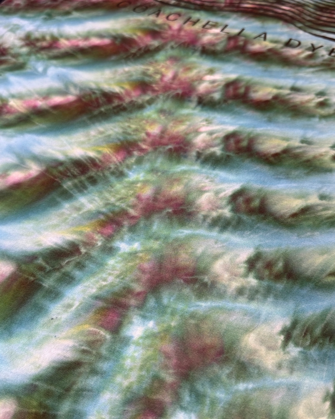 M - ice dyed ‘aurora’ cosmic rolled logo tee