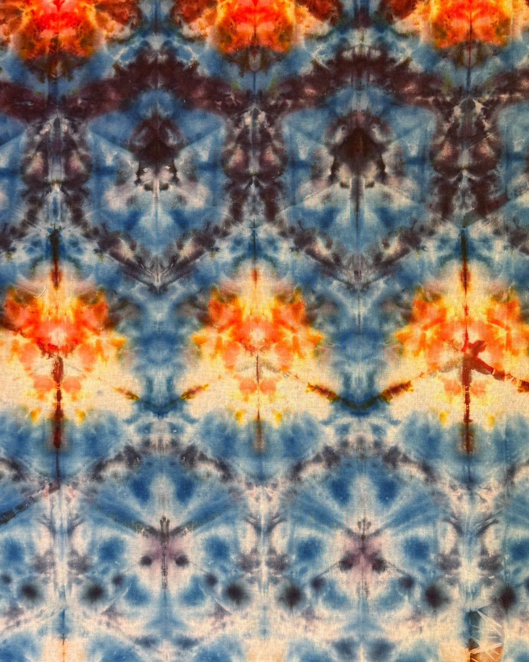 ice dyed blue and orange sekka shibori bandana