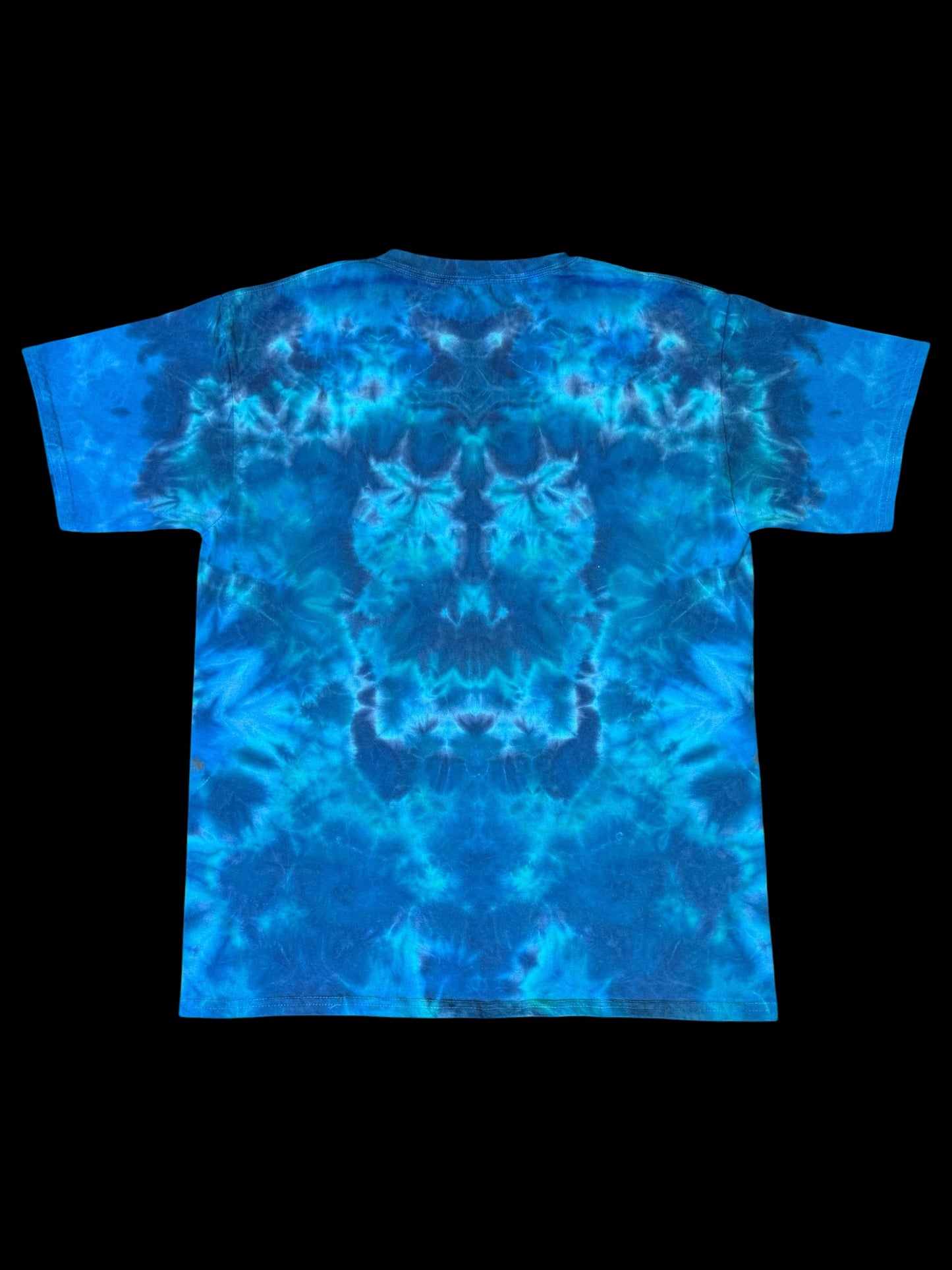 L - orange mandala on a sea of blues tee