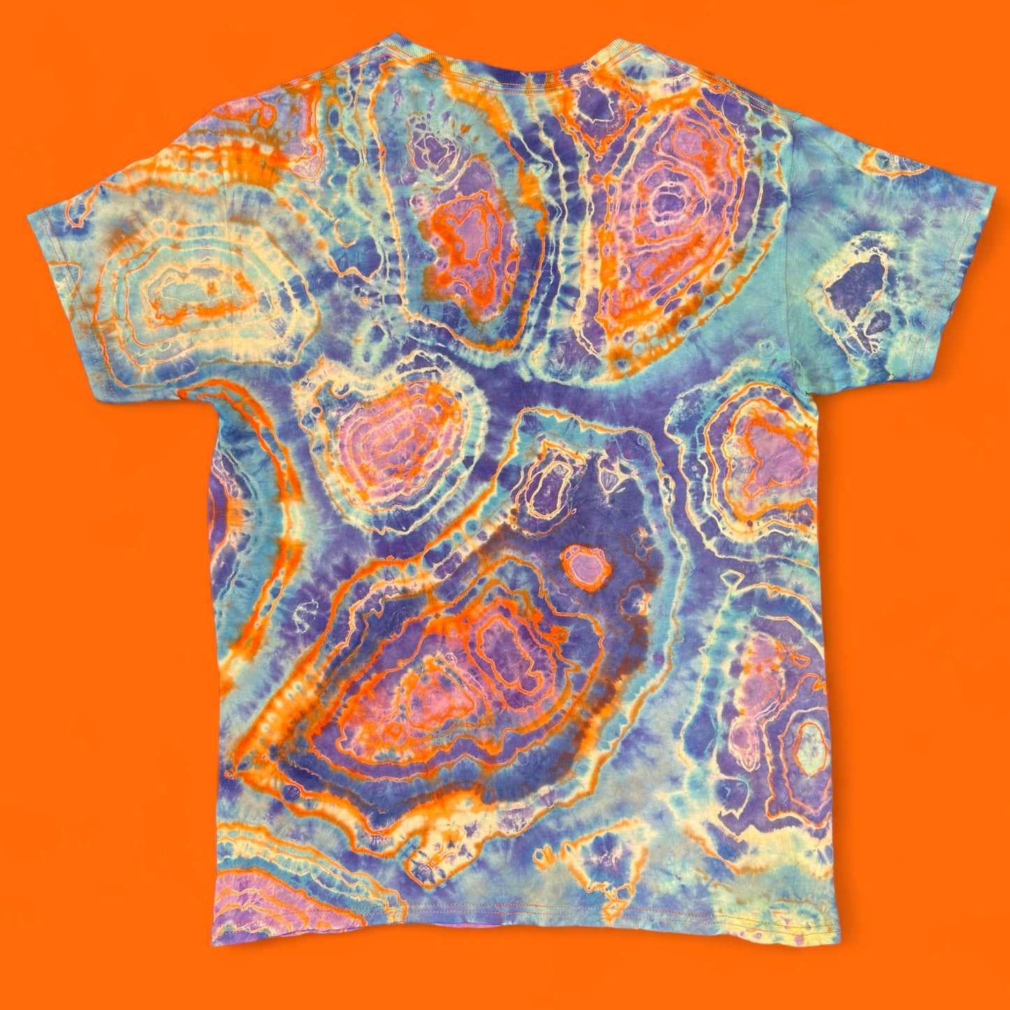M - orange reverse dyed geode style tee