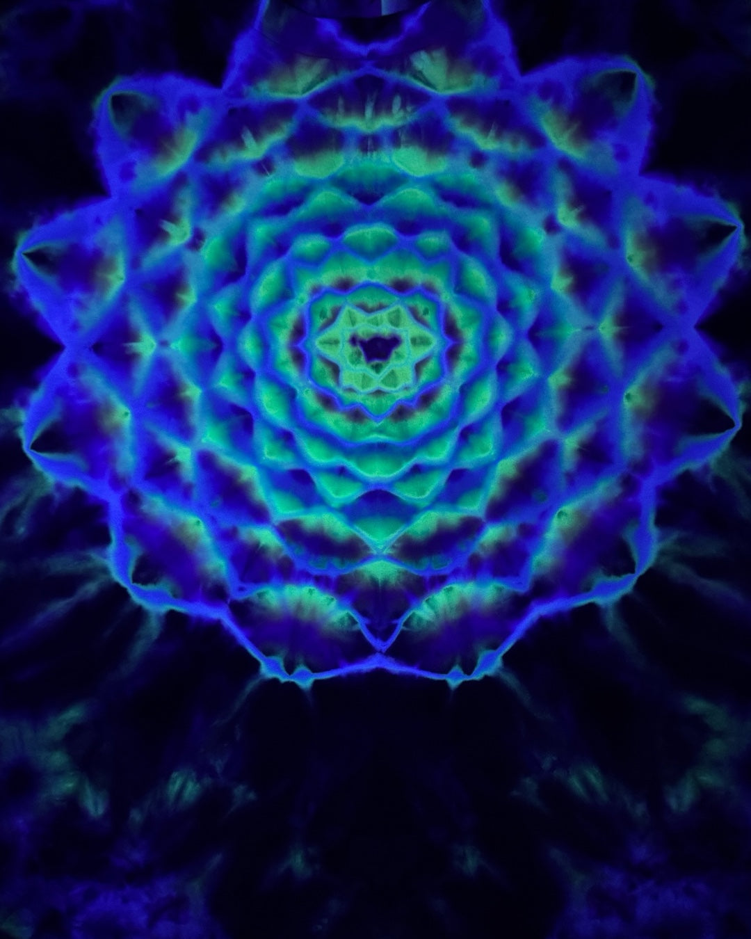 L - UV reactive mandala with dala-spine tee