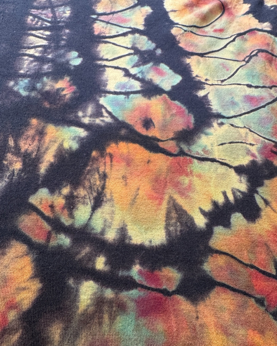 L - reversed ice dyed vintage Hermès tee